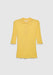A yellow short-sleeve knit top with a fitted silhouette, featuring a small pointed collar and a buttoned placket, displayed against a plain background.