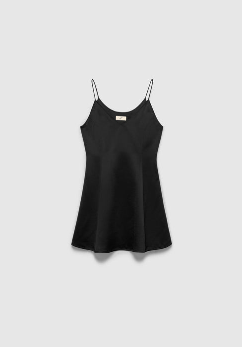 A black satin slip dress with thin spaghetti straps and a soft, flared silhouette, featuring a smooth, slightly glossy finish, displayed against a plain background.
