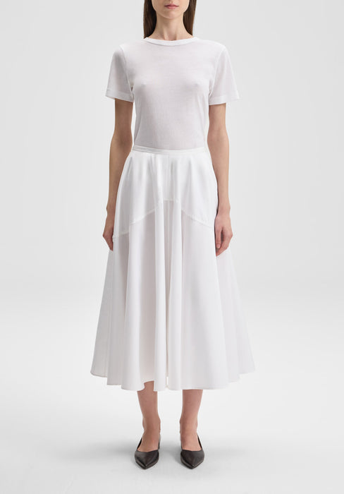 The outfit is shown from a straight-on, front-facing angle, with the model positioned directly toward the camera.