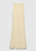 A light cream sleeveless maxi dress with a V-neckline and a tiered, gathered design, featuring soft pleating and a flowing silhouette, displayed against a plain background.