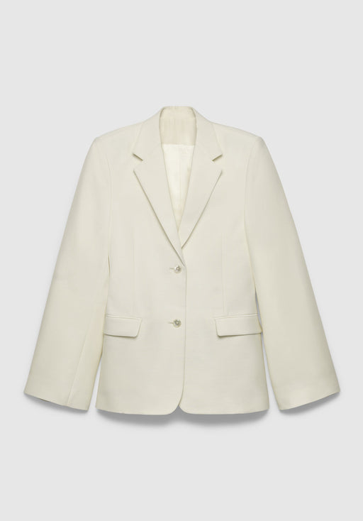 A cream-colored tailored blazer with a structured fit, featuring a notched lapel, two-button front closure, and flap pockets, displayed against a plain background.