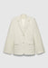 A cream-colored tailored blazer with a structured fit, featuring a notched lapel, two-button front closure, and flap pockets, displayed against a plain background.