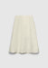 A cream-colored A-line skirt with a smooth, structured finish, featuring subtle panel seams and a clean, minimalist design, displayed against a plain background.