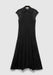A black sleeveless midi dress with a pointed collar and front button closure, featuring a textured lace fabric and a softly flared skirt, displayed against a plain background.