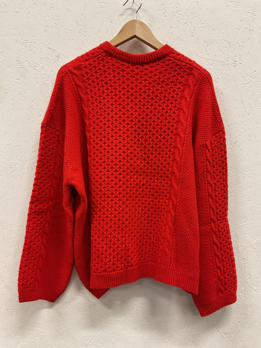 Red asymetric v-neck cable knit sweater