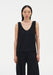 Black sleeveless tank top with a relaxed fit, featuring a scoop neckline and clean, minimal silhouette.
