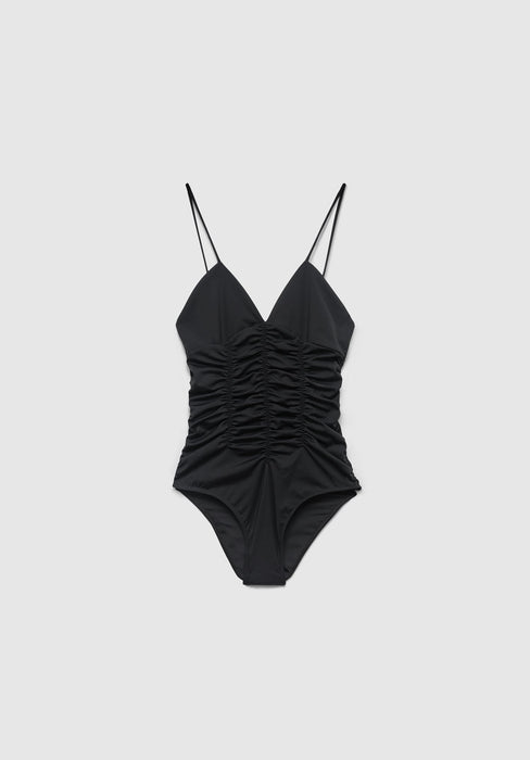 Black ruched one-piece swimsuit with a deep V-neckline and thin spaghetti straps, laid flat against a plain background.